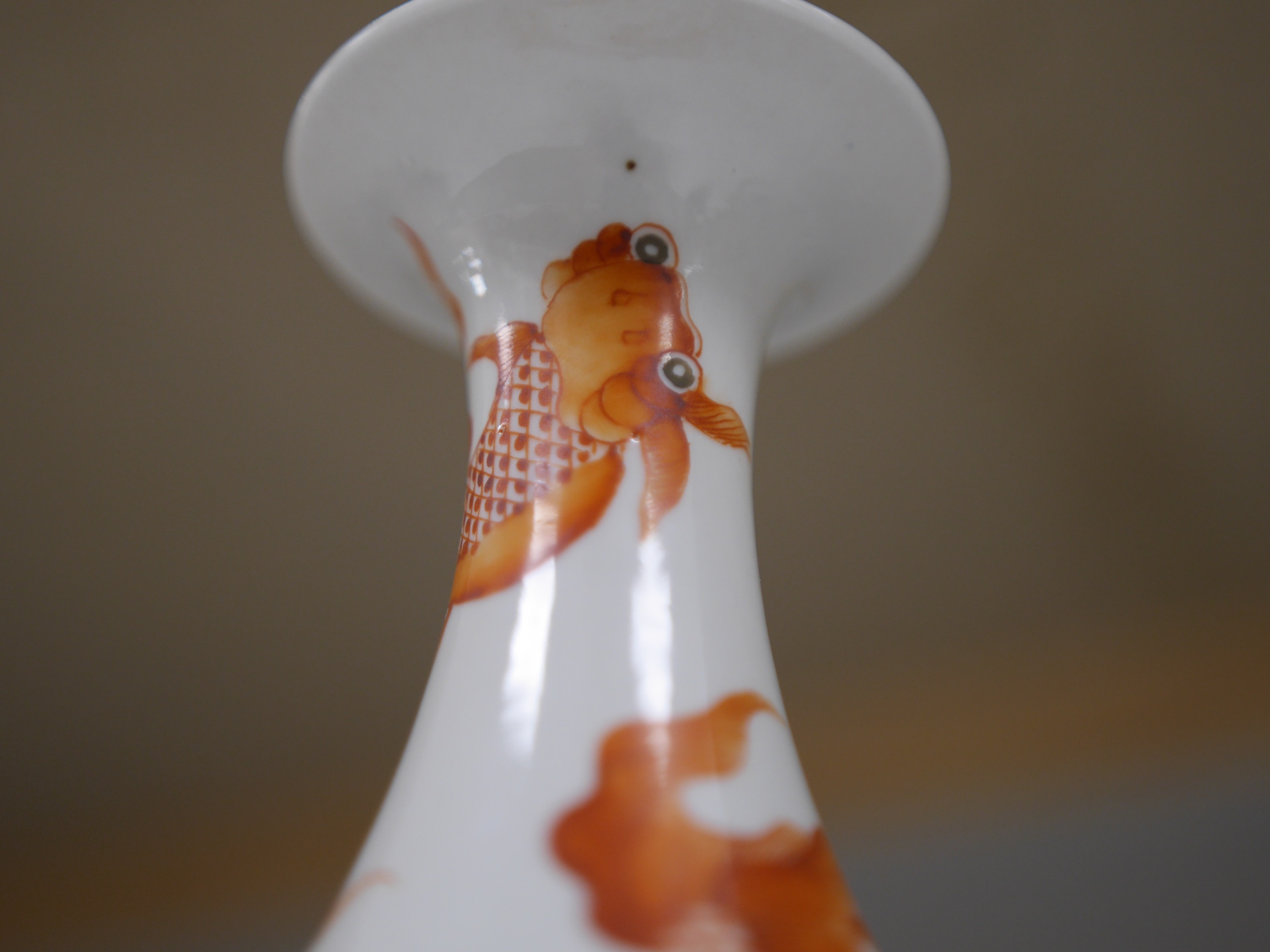 A Chinese iron red enamelled goldfish vase, 26cm high. Condition - good